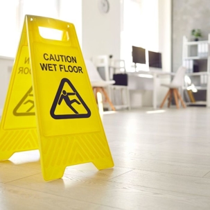 wet floor sign in office building